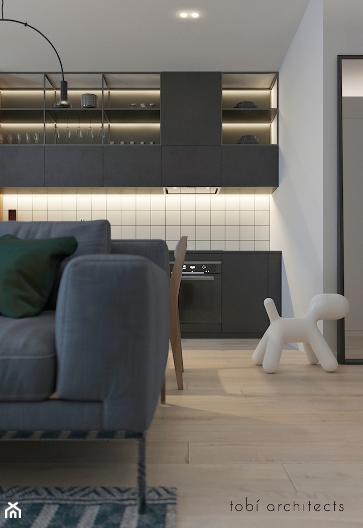 FREE APARTMENT - Mała otwarta z salonem z kamiennym blatem biała z zabudowaną lodówką kuchnia jednorzędowa, styl nowoczesny - zdjęcie od Tobi Architects - Homebook