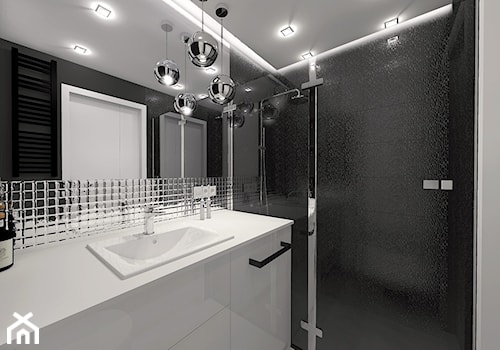 Niewielka biało-czarna łazienka z ukryta pralką - zdjęcie od sandroom