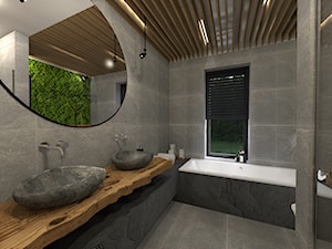 Łazienka w naturalnym kamieniu z dekoracyjnm mchem na ścianie - zdjęcie od sandroom