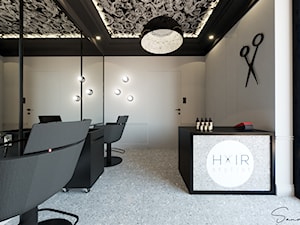 Salon fryzjerski z motywem lastryko i piękną, różaną fototapetą na suficie - zdjęcie od sandroom