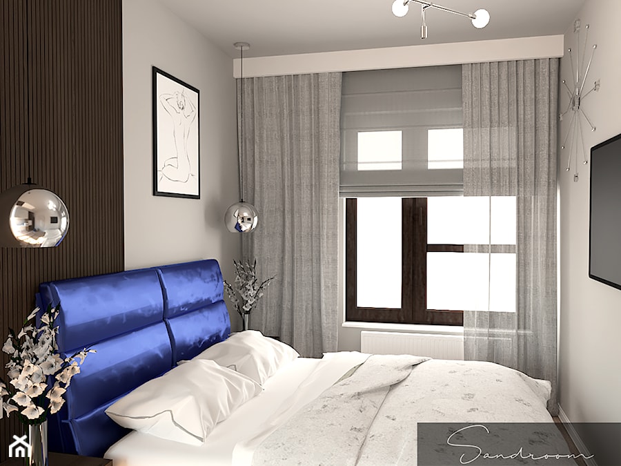 Sypialnia z granatowym, welurowym łóżkiem - zdjęcie od sandroom