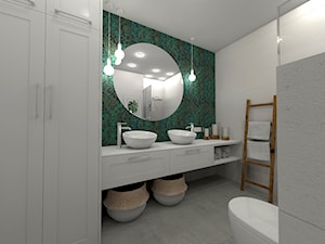 Łazienka z piękną, liściastą tapetą - zdjęcie od sandroom