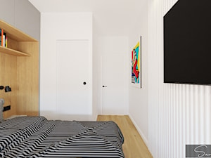 Sypialnia z zabudową nad łóżkiem oraz z garderobą - zdjęcie od sandroom