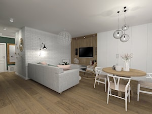 Jasny salon z kuchnią w stylu skandynawskim - zdjęcie od sandroom