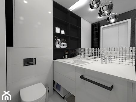 Aranżacje wnętrz - Łazienka: Niewielka biało-czarna łazienka z ukryta pralką - sandroom. Przeglądaj, dodawaj i zapisuj najlepsze zdjęcia, pomysły i inspiracje designerskie. W bazie mamy już prawie milion fotografii!