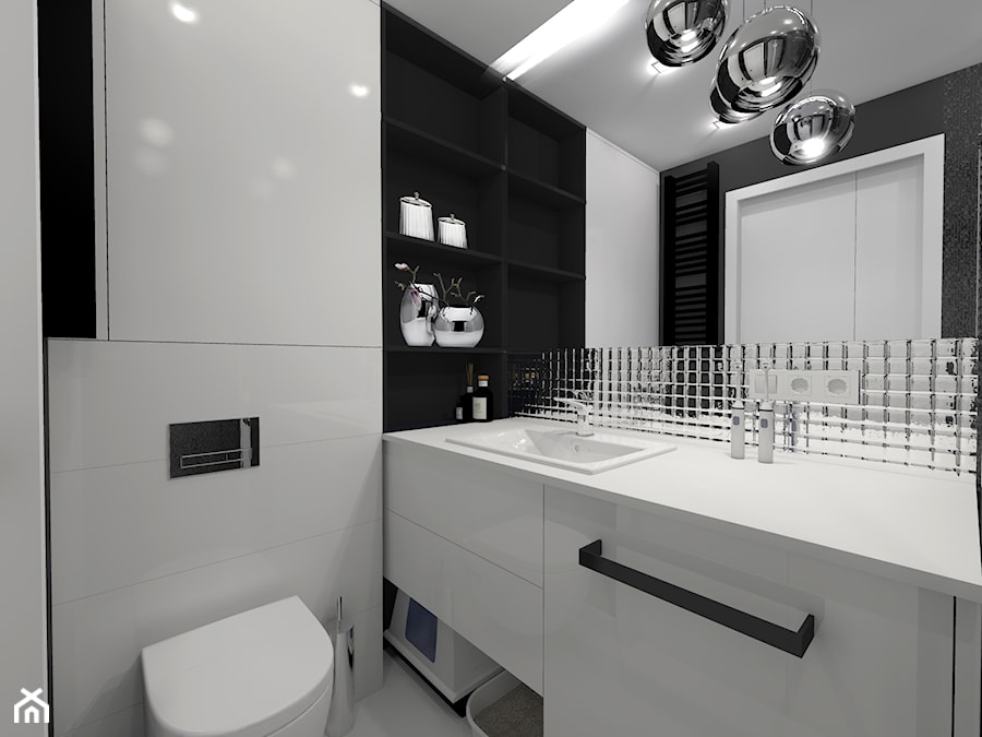 Niewielka biało-czarna łazienka z ukryta pralką - zdjęcie od sandroom