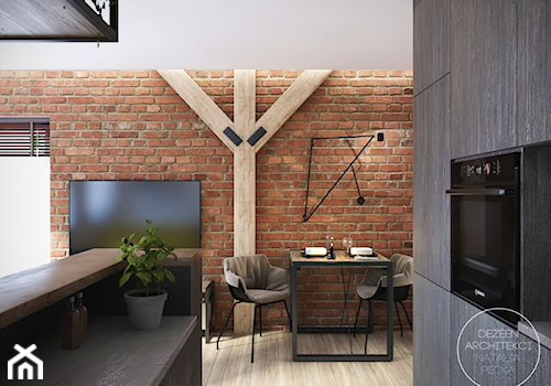 Mieszkanie w stylu industrialnym - Mała brązowa jadalnia w salonie w kuchni, styl industrialny - zdjęcie od DEZEEN ARCHITEKCI Natalia Pęcka