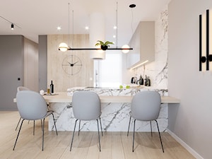 Wygodny apartament dla rodziny 2+2 - Mała otwarta biała szara z zabudowaną lodówką kuchnia w kształcie litery l z kompozytem na ścianie nad blatem kuchennym, styl nowoczesny - zdjęcie od kaim.work