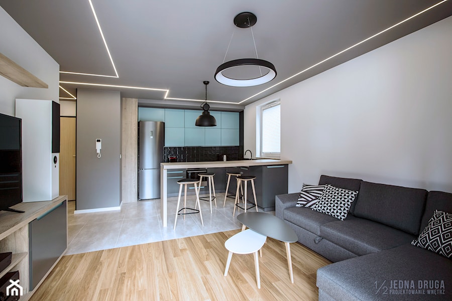 Mieszkanie pod wynajem, Oliwa - realizacja - Średni biały szary salon z kuchnią z jadalnią, styl nowoczesny - zdjęcie od JEDNA DRUGA