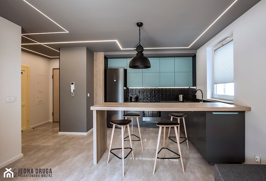 Mieszkanie pod wynajem, Oliwa - realizacja - Mały biały szary salon z kuchnią z jadalnią, styl nowoczesny - zdjęcie od JEDNA DRUGA