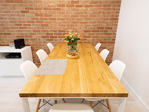 Realizacja projektu mieszkania w Zabrzu - Średnia biała jadalnia w salonie - zdjęcie od Wawoczny Architekt