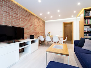 Realizacja projektu mieszkania w Zabrzu - Mały biały salon z jadalnią - zdjęcie od Wawoczny Architekt