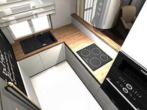 Kompaktowe mieszkanie dla dwojga - Mała zamknięta szara z zabudowaną lodówką z nablatowym zlewozmywakiem kuchnia w kształcie litery u z oknem, styl nowoczesny - zdjęcie od OPEN HOUSE INVEST