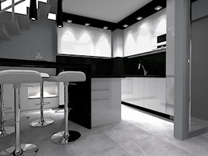 Dwupoziomowe na Długiej - Średnia otwarta czarna szara z zabudowaną lodówką kuchnia w kształcie litery u, styl nowoczesny - zdjęcie od OPEN HOUSE INVEST