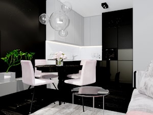 Apartament 42 m2 - Mała otwarta z salonem z kamiennym blatem biała czarna z zabudowaną lodówką kuchnia w kształcie litery l z marmurem nad blatem kuchennym, styl nowoczesny - zdjęcie od ONE HOME Studio Architektury Wnętrz