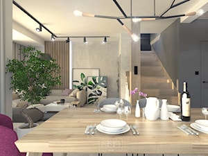 Dom, w którym szlachetne materiały spotykają nowoczesne formy - Duża szara jadalnia w salonie - zdjęcie od GRUPA NONO