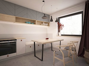 Dom minimalistów - Średnia zamknięta biała szara z zabudowaną lodówką kuchnia jednorzędowa z oknem - zdjęcie od GRUPA NONO