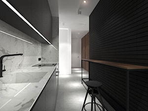 Mieszkanie w Gdańsku-styl minimalistyczny - Średnia otwarta czarna szara z zabudowaną lodówką z podblatowym zlewozmywakiem kuchnia jednorzędowa z marmurem nad blatem kuchennym, styl minimalistyczny - zdjęcie od MUKA MARCIN KUPTEL