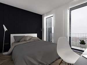 Mieszkanie w Gdańsku-styl minimalistyczny - Mała biała czarna z biurkiem sypialnia z balkonem / tarasem, styl minimalistyczny - zdjęcie od MUKA MARCIN KUPTEL