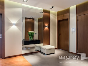 Wilanowski Apartament - Średni beżowy brązowy hol / przedpokój, styl nowoczesny - zdjęcie od TiM Grey Projektowanie Wnętrz