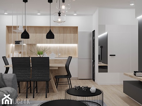 Aranżacje wnętrz - Kuchnia: APARTAMENT KONIN_80MKW_01_2019 - Średnia otwarta z salonem biała czarna z zabudowaną lodówką z nablatowym zlewozmywakiem kuchnia jednorzędowa z oknem, styl nowoczesny - Magda Mikołajczyk PRACOWNIA PROJEKTOWANIA WNĘTRZ. Przeglądaj, dodawaj i zapisuj najlepsze zdjęcia, pomysły i inspiracje designerskie. W bazie mamy już prawie milion fotografii!