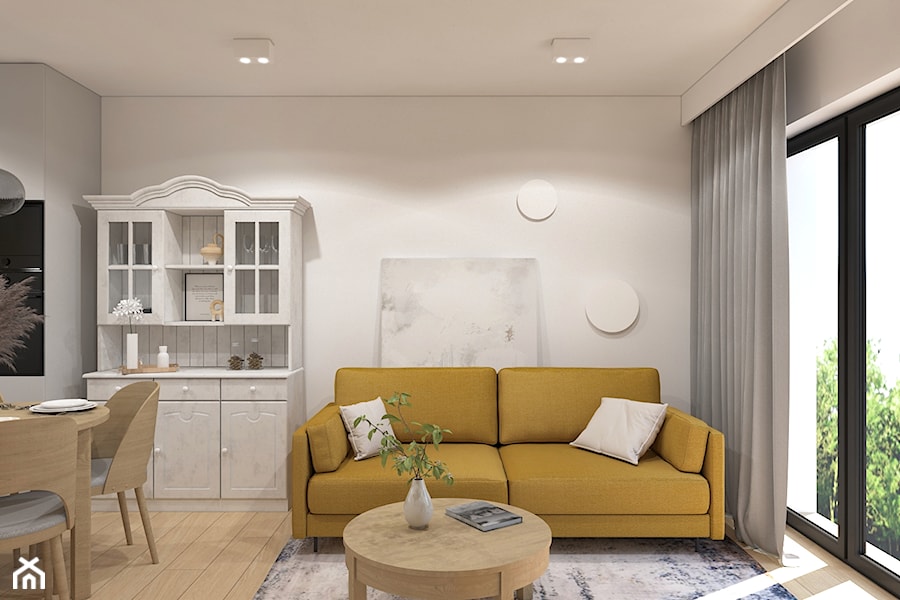 Musztardowa sofa w salonie - zdjęcie od MACZ Architektura