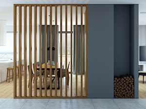 Ścianka ażurowa i wnęka na drewno - zdjęcie od MACZ Architektura