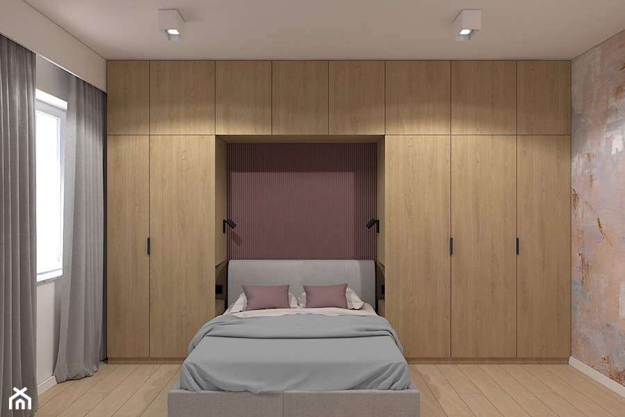 Łóżko pomiędzy szafami - zdjęcie od MACZ Architektura