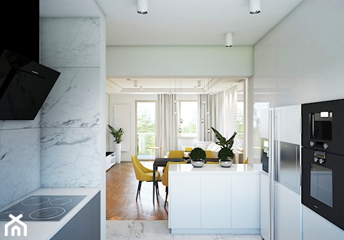 Średnia otwarta biała z zabudowaną lodówką kuchnia w kształcie litery g z marmurem nad blatem kuchennym, styl nowoczesny - zdjęcie od Finchstudio Architektura Wnętrz