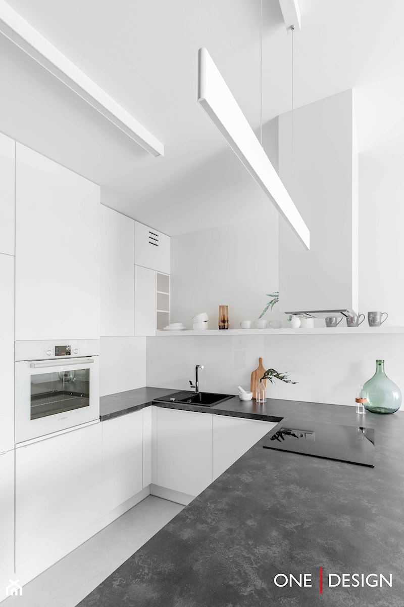 Minimalistyczne mieszkanie dla singla - Kuchnia - zdjęcie od One Design