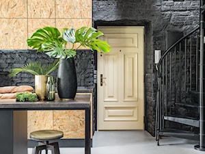 Mocne kontrasty na Wilczej - Mała otwarta z kamiennym blatem czarna kuchnia jednorzędowa z wyspą lub półwyspem - zdjęcie od One Design