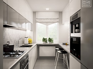 Biele i szarości w kuchni - zdjęcie od Kwadrat Design Studio