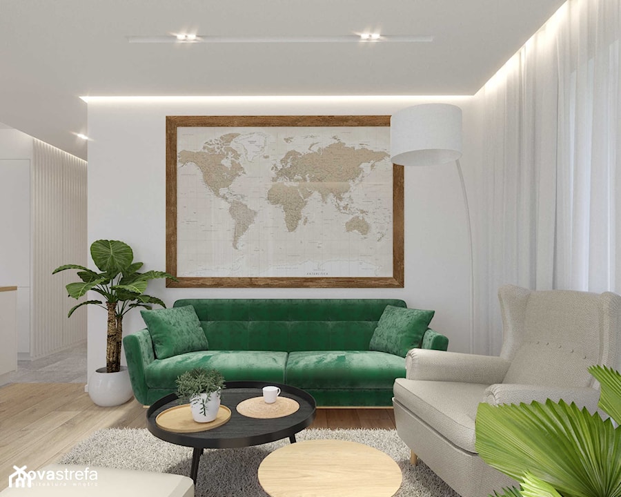 Salon z zieloną sofą i mapą świata - zdjęcie od Novastrefa - Architektura Wnętrz