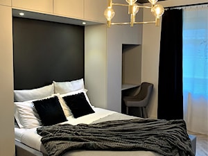 2 sypialnie – realizacja projektu 4 pok. na Gaju - Średnia biała czarna z biurkiem sypialnia, styl nowoczesny - zdjęcie od DekoDeko
