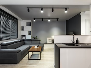 Dom w Modlniczce - Średni czarny salon z kuchnią, styl nowoczesny - zdjęcie od STUDIO KUGO