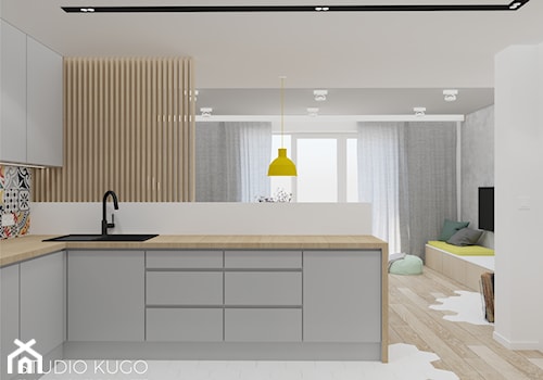 Dom w Zabrzu - Średnia otwarta z salonem biała szara z nablatowym zlewozmywakiem kuchnia w kształcie litery l z oknem - zdjęcie od STUDIO KUGO