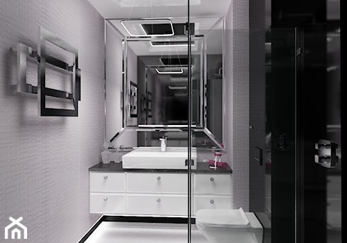 Z pazurem - Średnia na poddaszu bez okna z lustrem łazienka, styl nowoczesny - zdjęcie od Homeemotions.architects