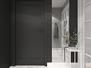 Mieszkanie łączące klasykę i nowoczesność - Mały z wieszakiem czarny szary hol / przedpokój, styl tradycyjny - zdjęcie od Ambience. Interior design