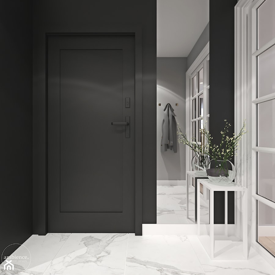 Mieszkanie łączące klasykę i nowoczesność - Mały z wieszakiem czarny szary hol / przedpokój, styl tradycyjny - zdjęcie od Ambience. Interior design
