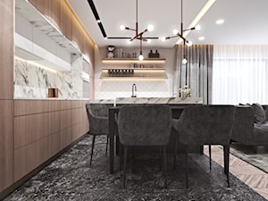 Apartament w Londynie - strefa dzienna - Duża otwarta z salonem szara z zabudowaną lodówką kuchnia dwurzędowa z wyspą lub półwyspem z oknem z marmurem nad blatem kuchennym, styl nowoczesny - zdjęcie od Ambience. Interior design