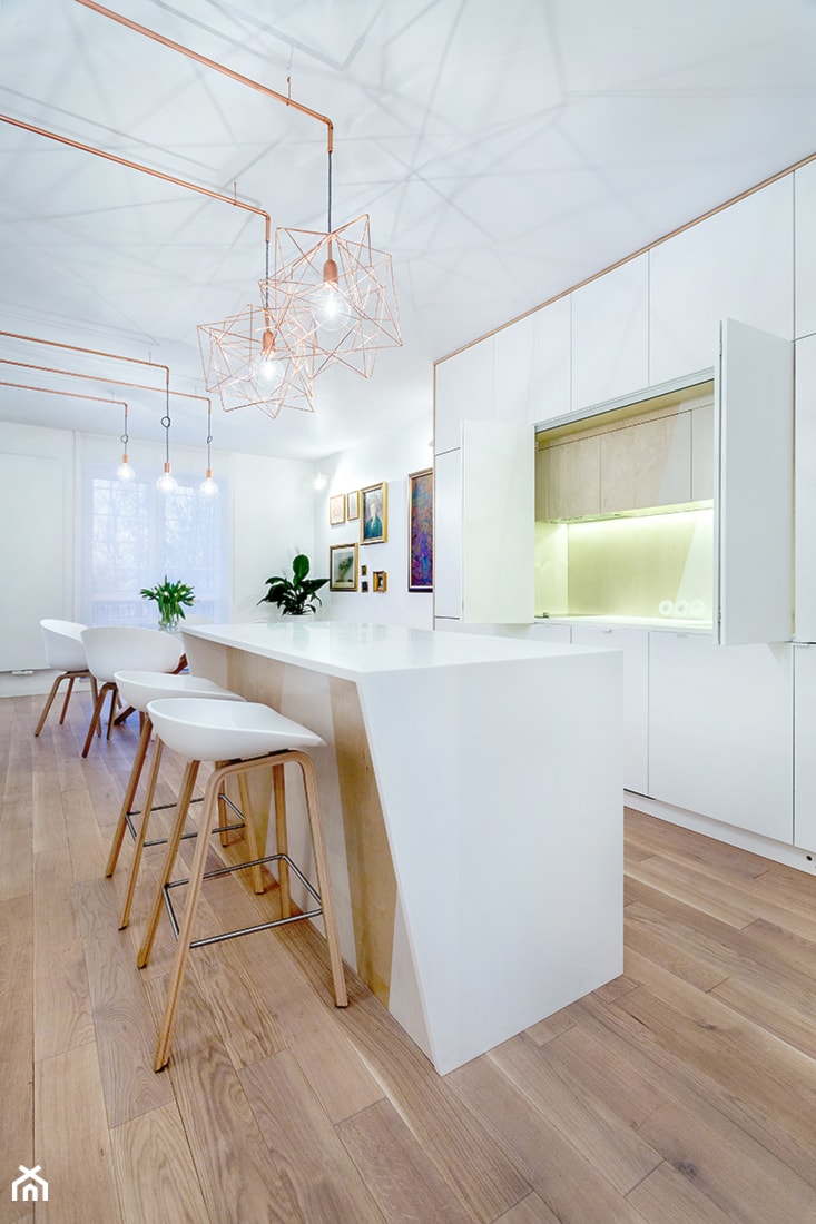 Kuchnie - Duża otwarta z salonem biała z zabudowaną lodówką kuchnia jednorzędowa z wyspą lub półwyspem, styl skandynawski - zdjęcie od Max Kuchnie