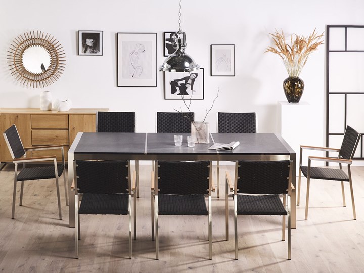 Zestaw mebli ogrodowych jadalniany szary stół granit/bazalt 220 x 100 cm 8 czarnych krzeseł z technorattanu sztaplowanych Stal Stoły z krzesłami Zawartość zestawu Krzesła