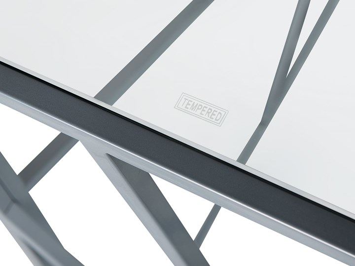 Beliani Konsola srebrna metalowa 100 x 40 cm szklany blat geometryczna rama nowoczesna