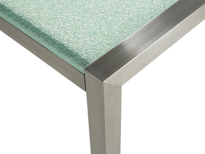 Beliani Zestaw ogrodowy stół z krzesłami blat szkło hartowane efekt tłuczonego szkła 220 x 100 cm 6 krzeseł czarnych z technorattanu sztaplowanych Stal Stoły z krzesłami Kategoria Zestawy mebli ogrodowych