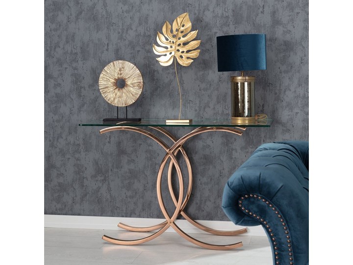 Konsola Chica rose gold 128x40x79cm, 128 × 40 × 79 cm Szkło Szerokość 128 cm Głębokość 40 cm Z samym blatem Metal Kategoria Konsole Stal nierdzewna Styl Glamour